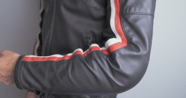 Biker Checks Elbow Protection Motorcycle Leather Jacket Side View Close — Wideo stockowe