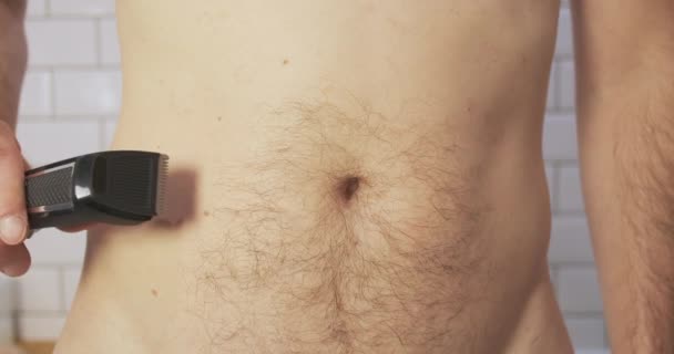 Man Removes Hair His Belly Electric Clipper Trimmer Front View — Video Stock