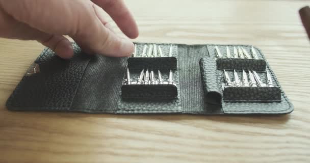 Man Opens Set Mini Screwdrivers Interchangeable Bits Black Leather Case — Video Stock