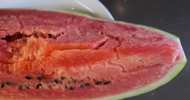 Huge Piece Red Watermelon Lies Plate Panorama Plate Top View — Vídeo de Stock