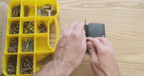 Man Opens Set Mini Screwdrivers Selects Right Bit Inserts Holder — Stockvideo
