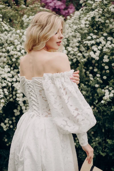 Young Blonde Girl White Wedding Dress Open Top White Flowers — Stockfoto