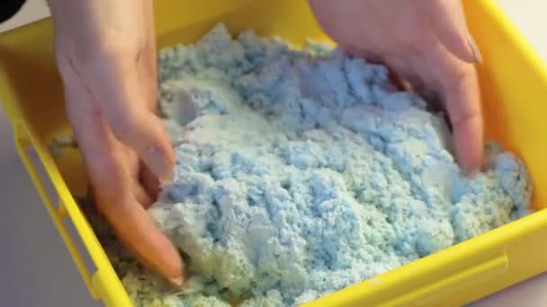 Womans Hands Playing Blue Kinetic Magic Sand Stress Relaxation Activity — Stockvideo