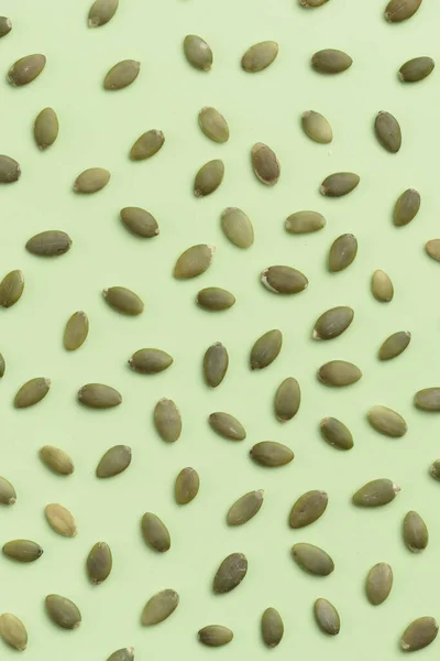 Pumpkin Seeds Green Background — Stock Photo, Image