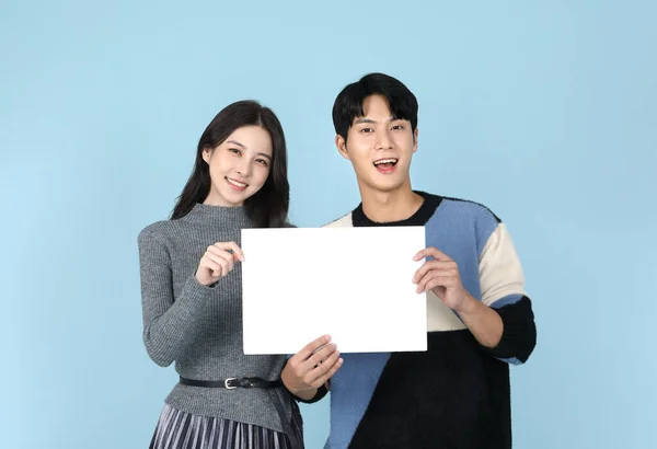 Asian Korean Couple Pointing Empty Board Copyspace — 图库照片