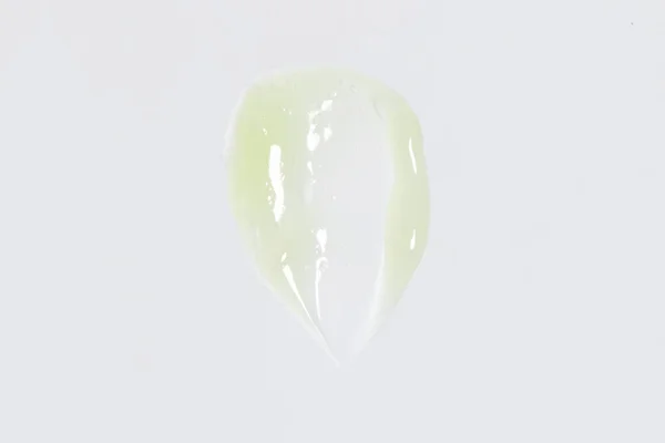 绿色面霜 白色背景的孤立涂色化妆品质感 — 图库照片