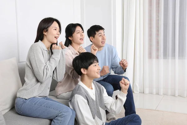 Asian Korean Family Photo Family Cheering While Watching — стокове фото