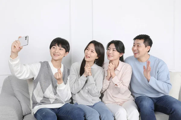 Asian Korean Family Photo Family Having Video Call Together — стокове фото