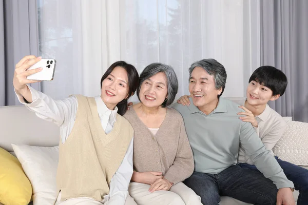 Asian Korean Family Taking Selfie — стокове фото