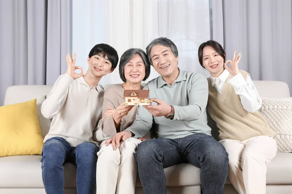 Asian Korean Family_House Model Held Grandparents Grandchildren — стокове фото