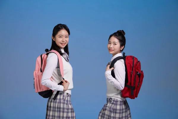 mz generation Asian Korean female hipster influencer, creator concept : who are looking back with a backpack image image image