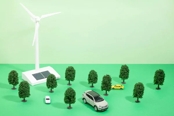 protect earth and environment concept, wind power tree, car miniature