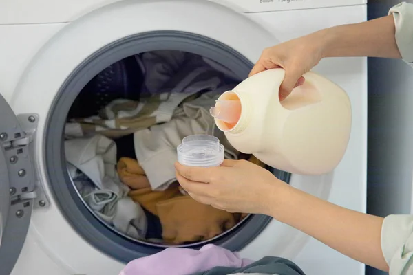 aesthetic laundry concept, using detergent