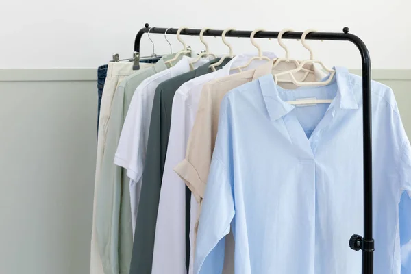 aesthetic laundry concept, clothes hung on a hangers