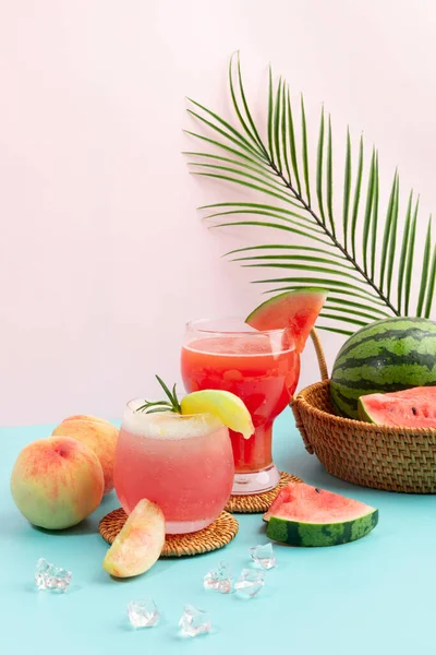 Summer drink background with peach and watermelon juice drink