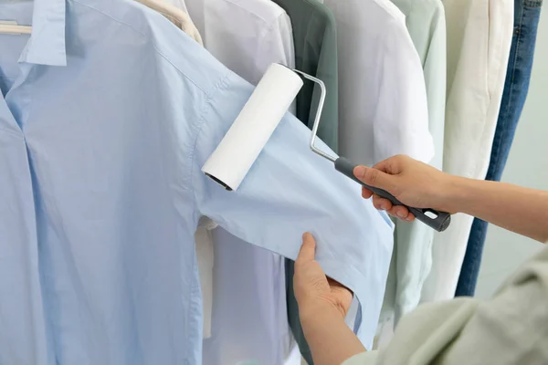 aesthetic laundry concept, removing dust from clothes