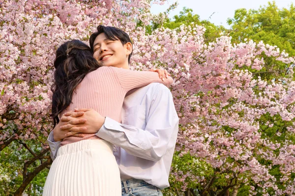 Korean Asian Couple Enjoying Spring Date_Hugging — 스톡 사진