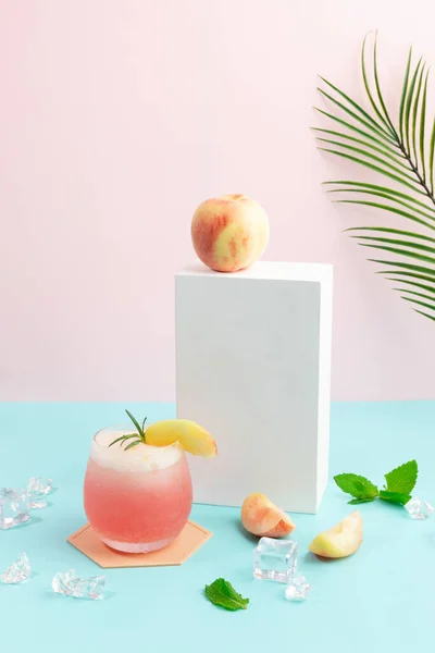 summer background with peach ade drink with peaches fruit