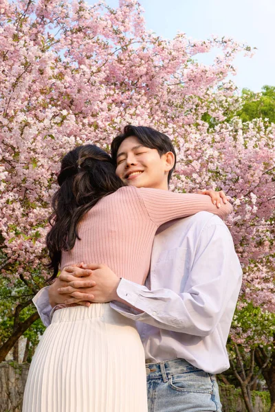 Korean Asian Couple Enjoying Spring Date_Hugging — ストック写真