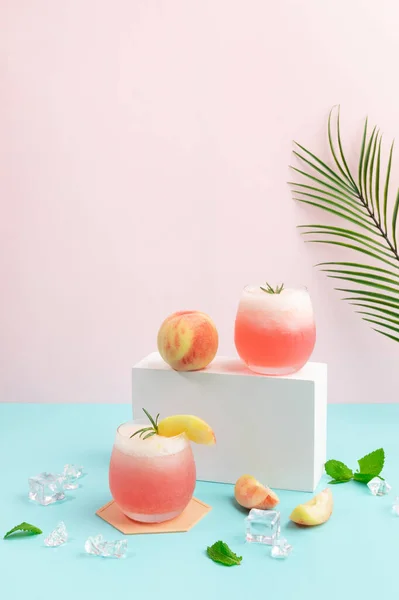 summer background with peach ade drink with peaches fruit