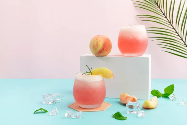 summer background with peach ade drink with peaches fruit