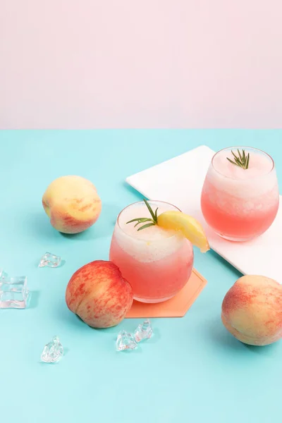 summer background with peach ade drink with peaches fruit
