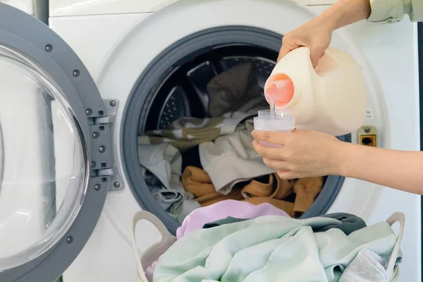 aesthetic laundry concept, using detergent