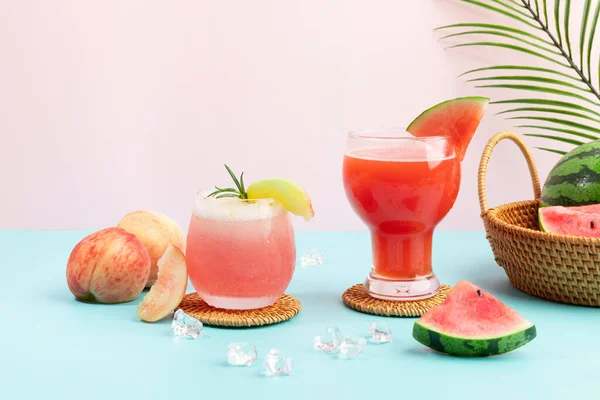 Summer drink background with peach and watermelon juice drink