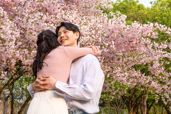 Korean Asian Couple Enjoying Spring Date_Hugging — 스톡 사진