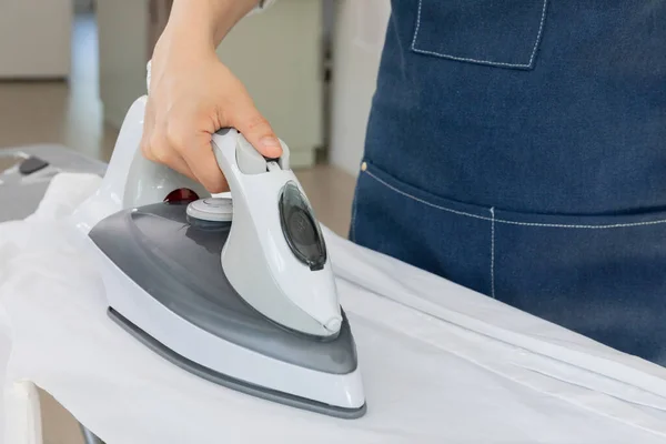 aesthetic laundry concept_ironing shirts