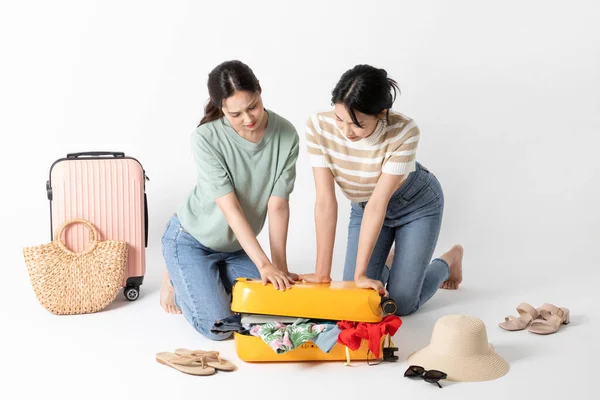 Two Korean Beautiful Young Women Packing Suitcase Trip — Stock Photo, Image