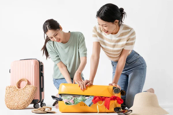 Two Korean Beautiful Young Women Packing Suitcase Trip — Stock Photo, Image