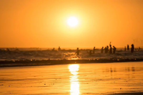 Selective Focus Sand Sunset Beach Silhouettes People Background Sea — Stock Photo, Image