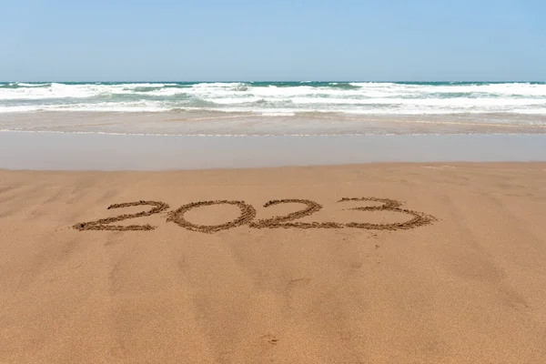 Year 2023 Written Sand Beach Sea Background — стоковое фото