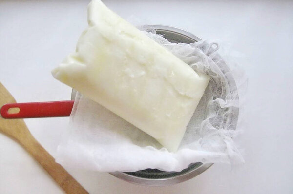 Put the frozen kefir in a colander with cheesecloth and leave in the room until completely thawed.