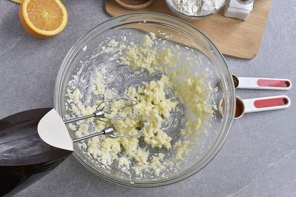 Whisk the white sugar and butter until fluffy.