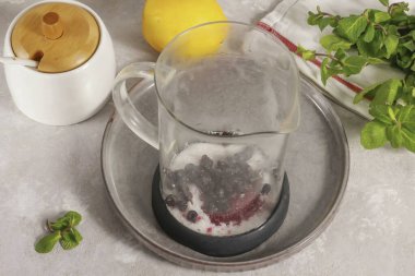 Arrange the washed blueberries, fresh or frozen.