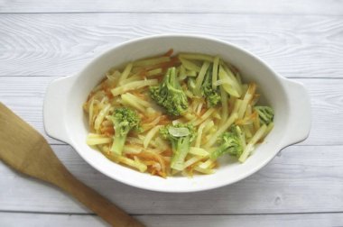 Transfer vegetables to a baking dish.