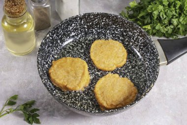 Gently turn over to the other side and fry for the same amount of time.