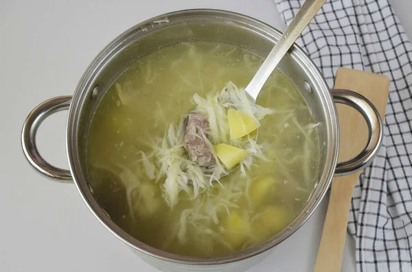 Add Potatoes Broth Boil Minutes Add Cabbage Cook Another Minutes — стоковое фото