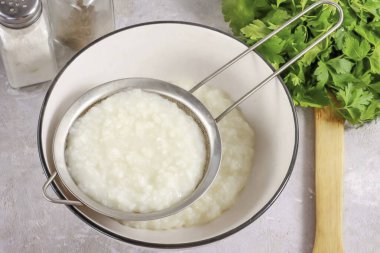 Then rub the contents of the container through a strainer.