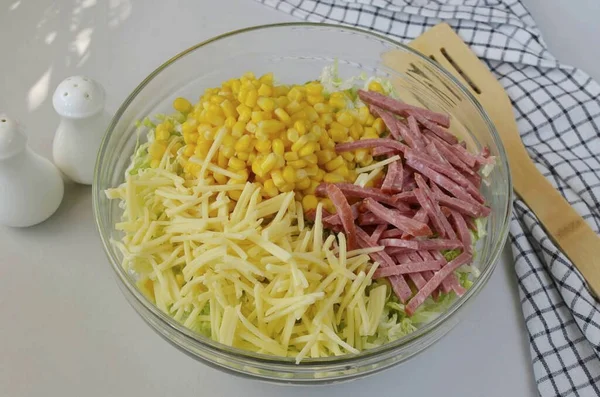 Cut Sausage Cheese Thin Slices Add Corn Salad Bowl — Stock Photo, Image