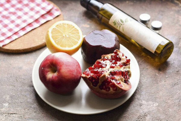 Prepare all the ingredients needed to make Beet Pomegranate Apple Salad.