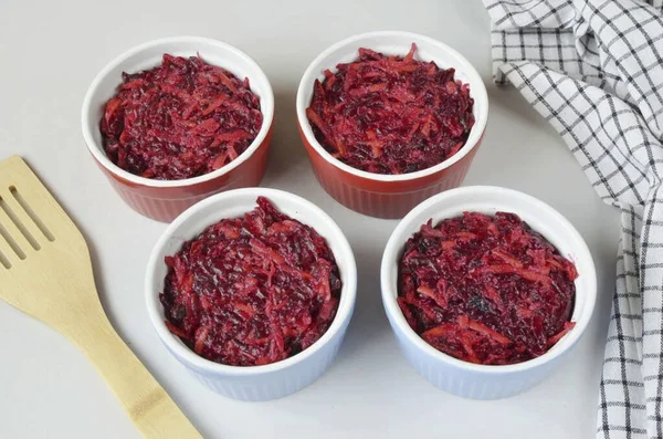 Preheat the oven to 180 degrees. Divide the beet-carrot mass into ramekins or bake in one large dish. If you want, you can grease the mold with butter, I do not grease.