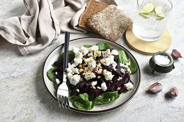 Serve salad with toasted rye bread. Sweet juicy beets and salty bright feta complement each other perfectly. Make this simple salad and see for yourself! Bon Appetit!