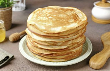 Thick pancakes on kefir are ready. Surely every housewife has her own proven recipe for pancakes. Today I want to offer you a recipe for thick pancakes on kefir. clipart