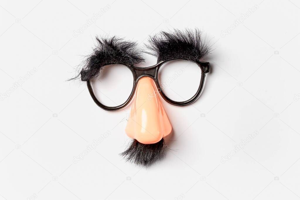 Funny face mask on white background