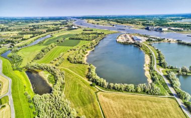 drone shot of the river Maas with floodplain.