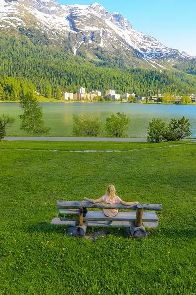 Woman on bench of St. Moritz — Stock Photo, Image