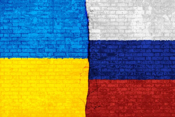 Oekraïne en Rusland oorlog met breuk op de muur — Stockfoto